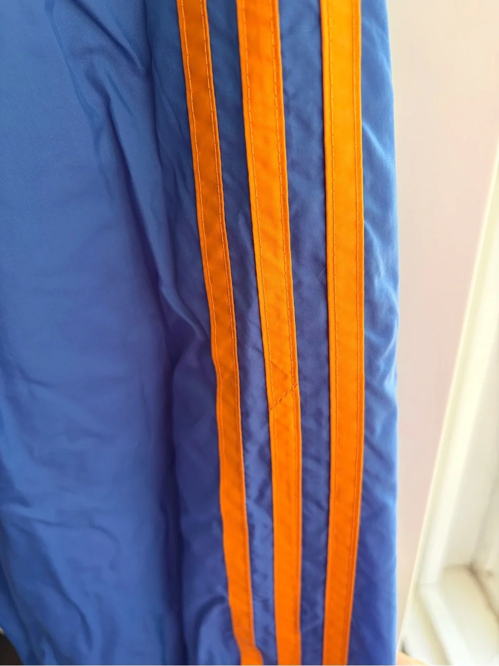 Vintage Adidas Windbreaker Blue Track Pants with Orange Side Stripes